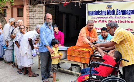 Daily distribution of Milk and Bread to poor children and needy people